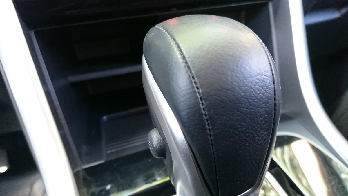 Automatic shift knob with store overdrive button