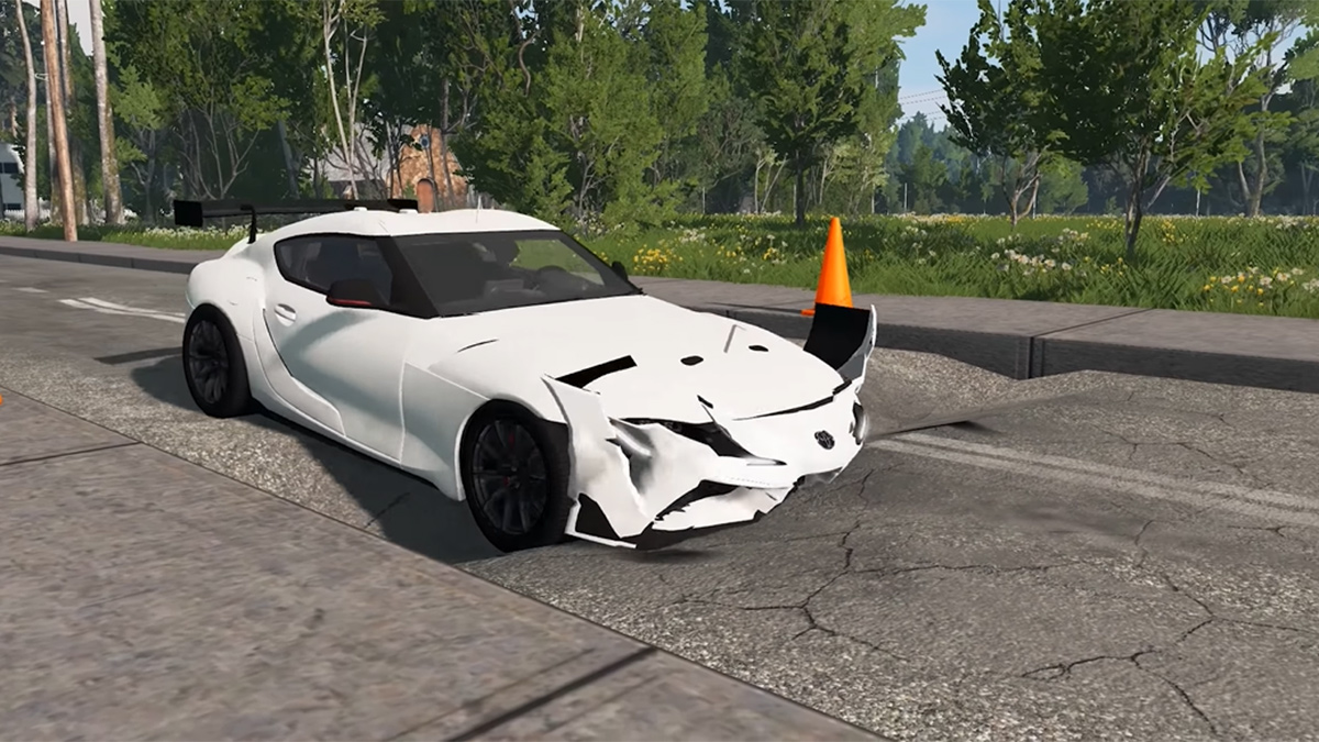 Watch cars get wrecked by pothole in BeamNG