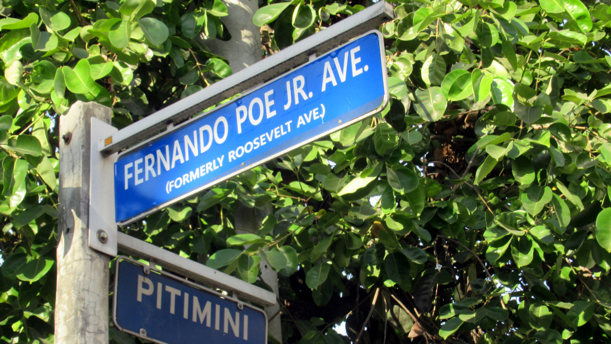 Image of Fernando Poe Jr. Avenue street sign in Quezon City, Philippines, by Video13 via Wikimedia Commons