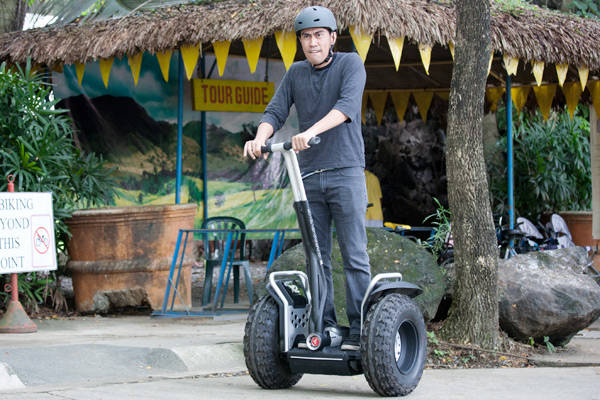 Ramon Bautista rides the Segway PT