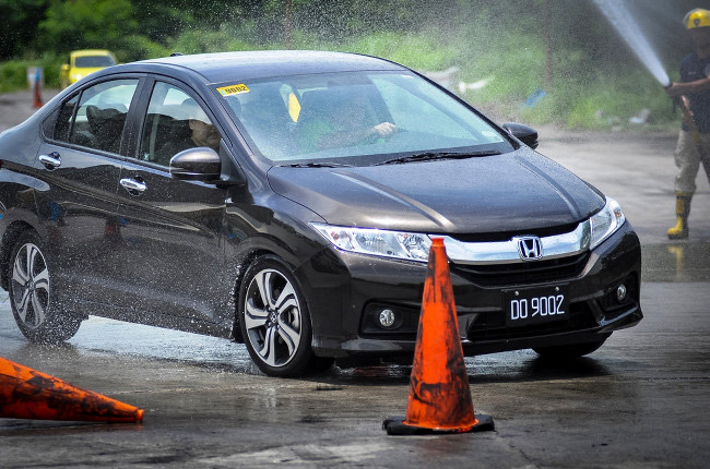 We tested the Vehicle Stability Assist system of the Jazz and City