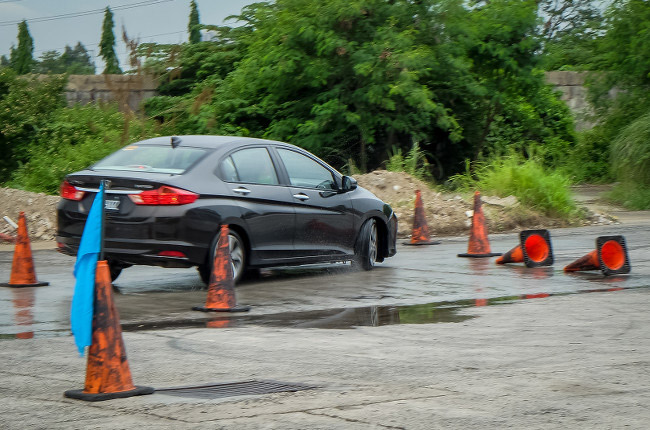 We tested the Vehicle Stability Assist system of the Jazz and City