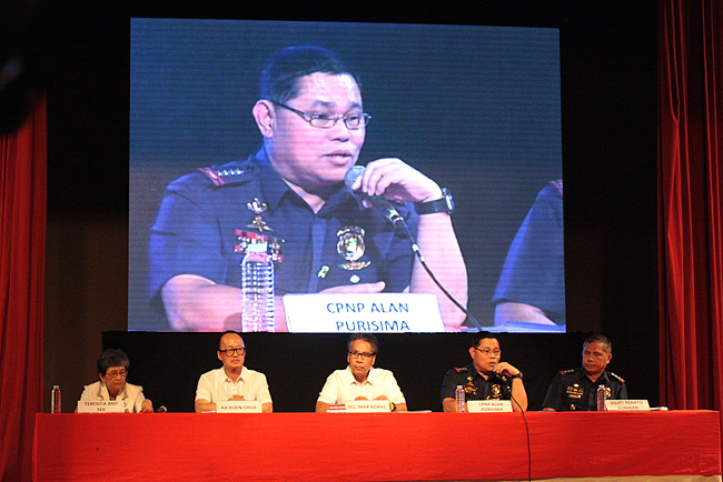 Driving safety tip: Should you pull over at that checkpoint?